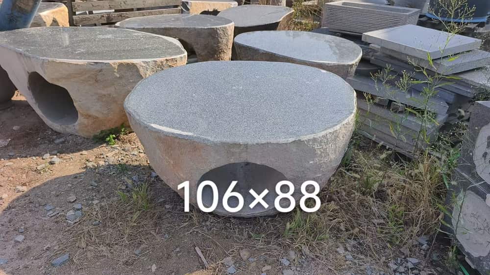 Oval natural stone wash basin shown with size marking in the workshop