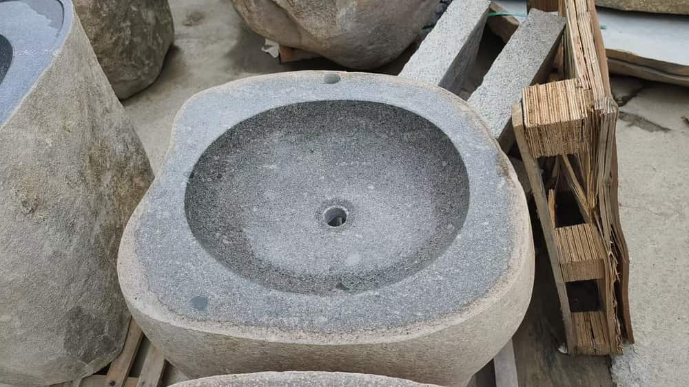 Square natural stone basin with smooth bowl and drain opening